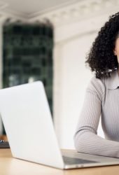 engaged-young-professional-using-tablet-alongside-2024-03-19-15-58-58-utc